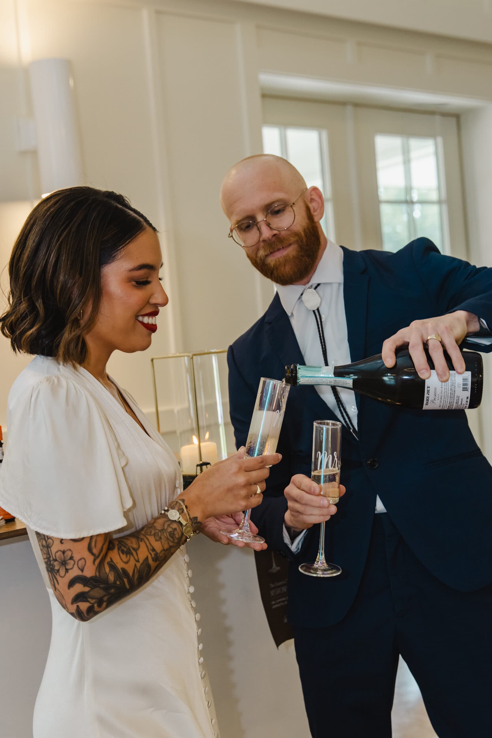 Newlyweds sharing a champagne toast
